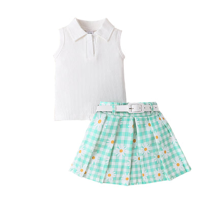 Ensemble haut sans manches et jupe avec ceinture