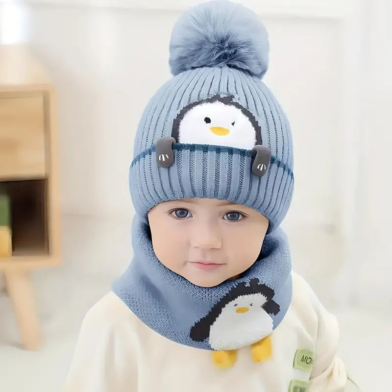 Bonnet écharpe motif pingouin.