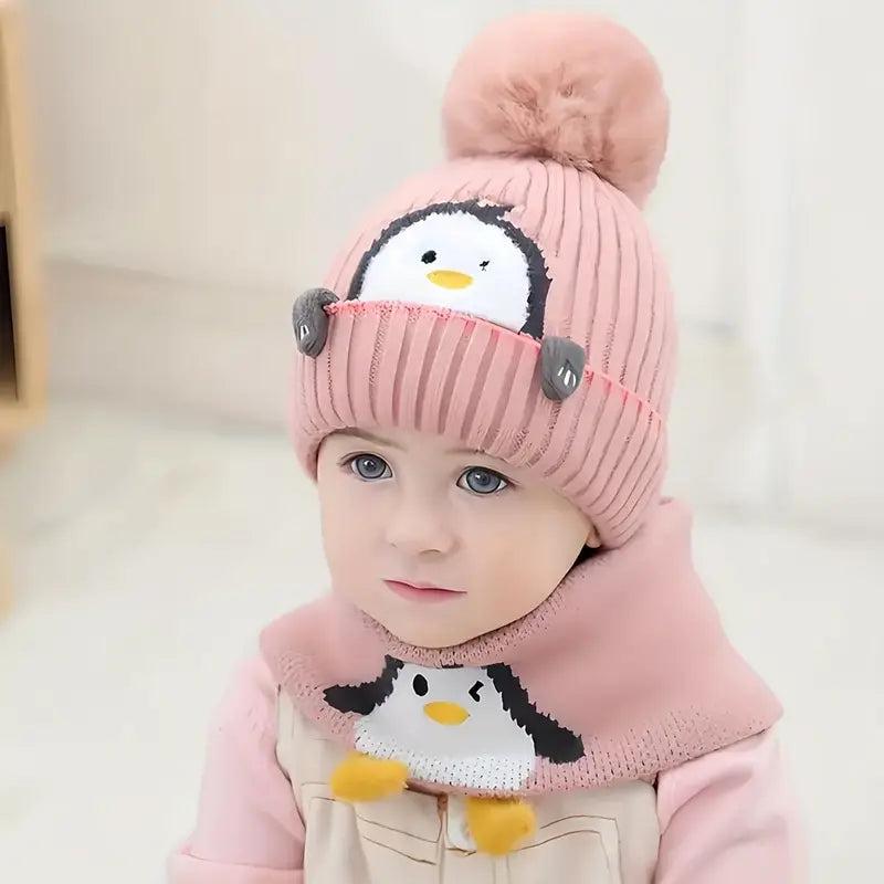 Bonnet écharpe motif pingouin.