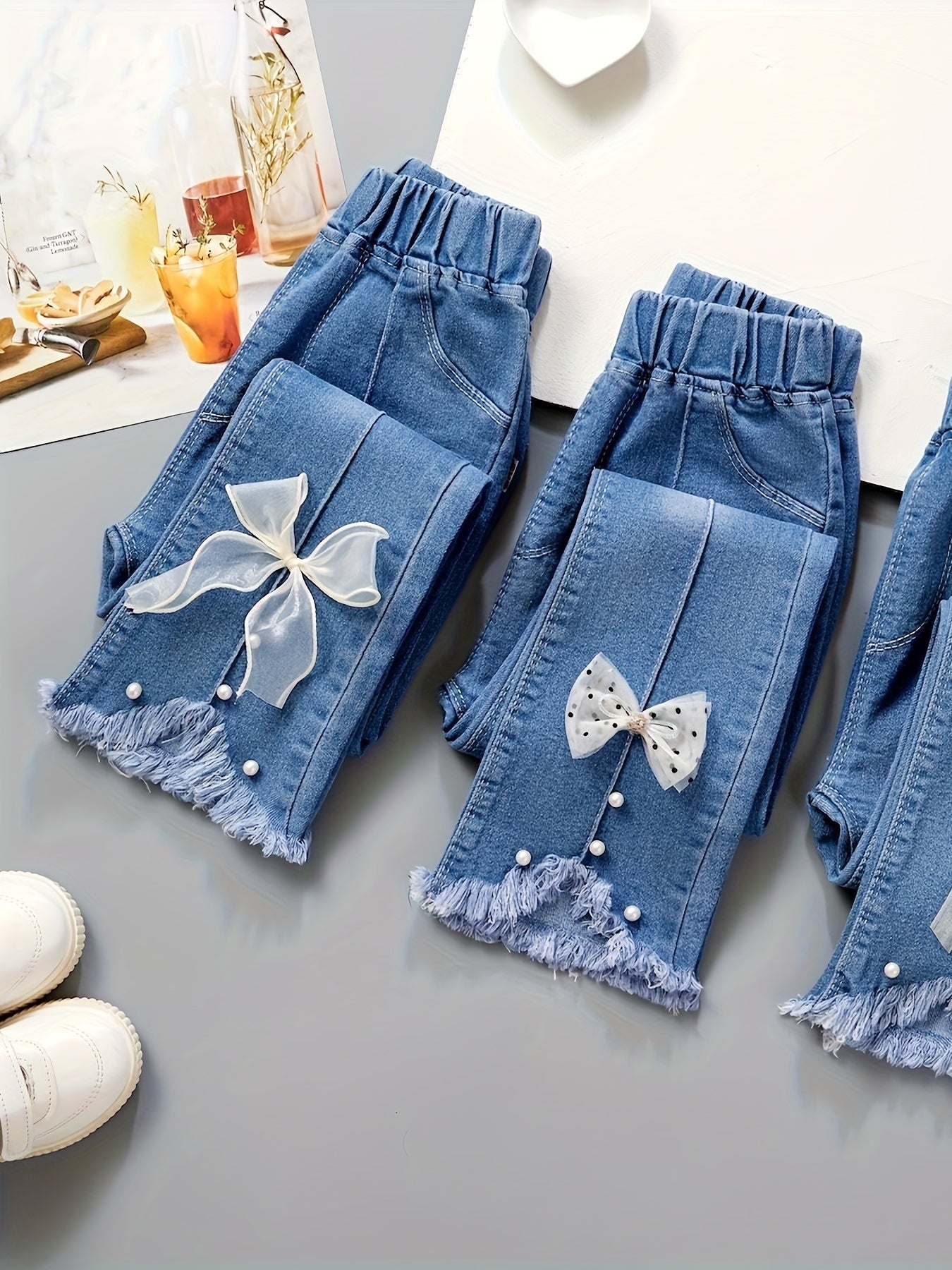 Pantalon en jean pour fille avec perles et nœud