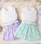 Ensemble haut sans manches et jupe avec ceinture