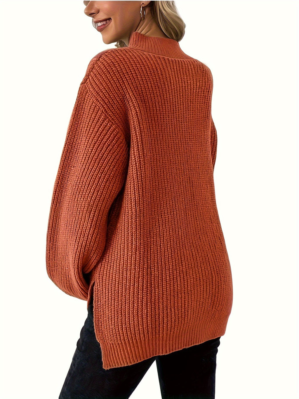 Pull de maternité en tricot avec ourlet fendu.