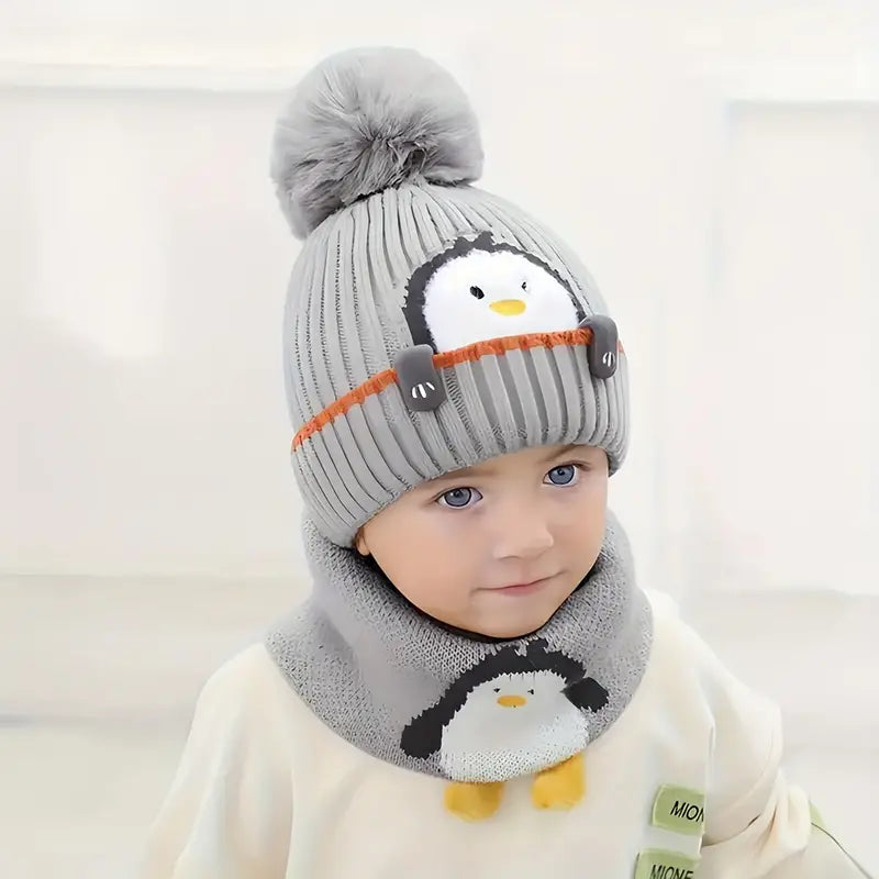 Bonnet écharpe motif pingouin.