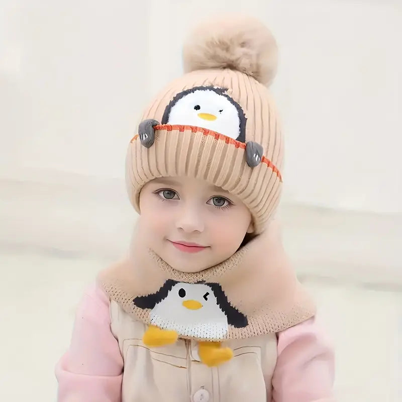 Bonnet écharpe motif pingouin.